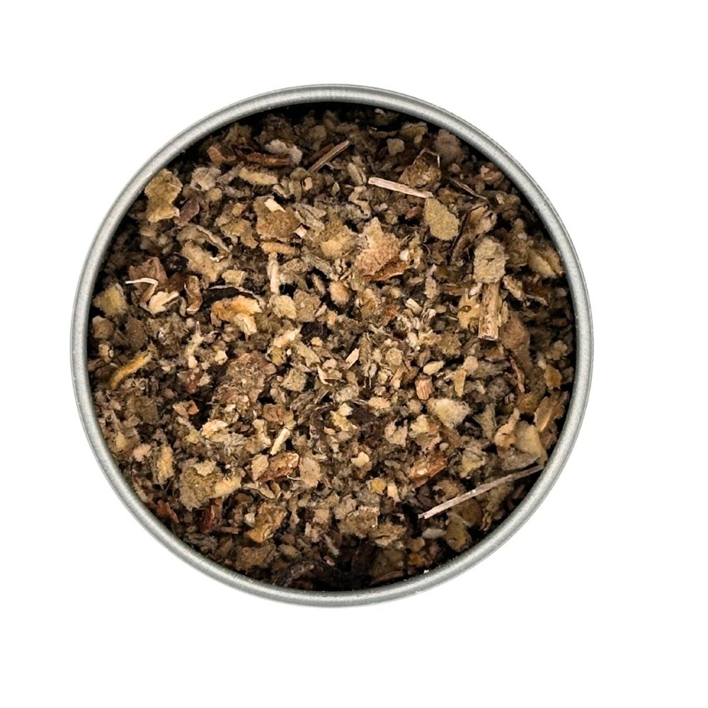 Dried cut and sifted mullein leaf in an open tin, pale green-brown flakes viewed from above